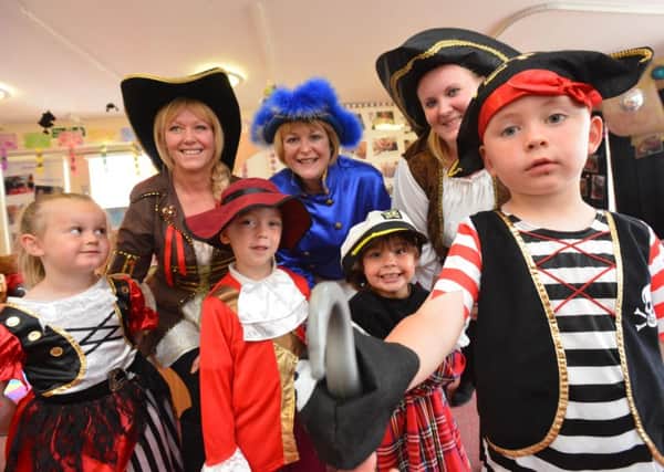 Four-year-old Daniel Grey, front, leads the way at Seaham Harbour Nursery School annual fancy dress toddle
.