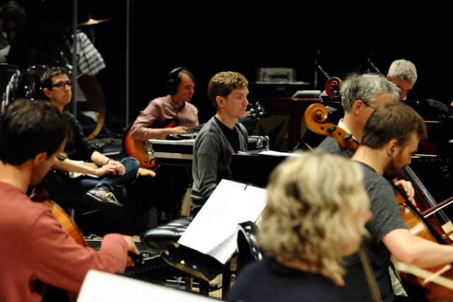 Pictured: Warm Digits and Field Music (centre) rehearse with Royal Northern Sinfonia