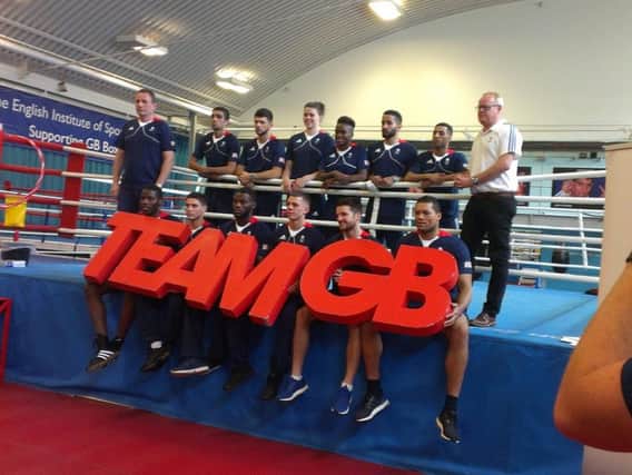 Team GB's boxing side and performance director Rob McCracken (back row left) and Team GB'S Chef de Mission, Mark England (back right) face the media in Sheffield