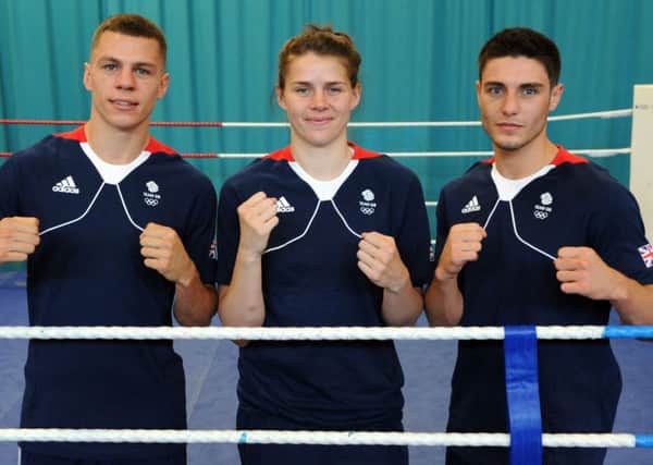 Pat McCormack (left), Savannah Marshall and Josh Kelly (right) during the Olympics team announcement at the English Institute of Sport