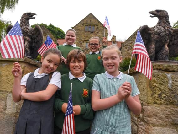 Pupils from Broadway Junior School in Sunderland hold Fourth of July celebrations at Washington Old Hall in 2015.