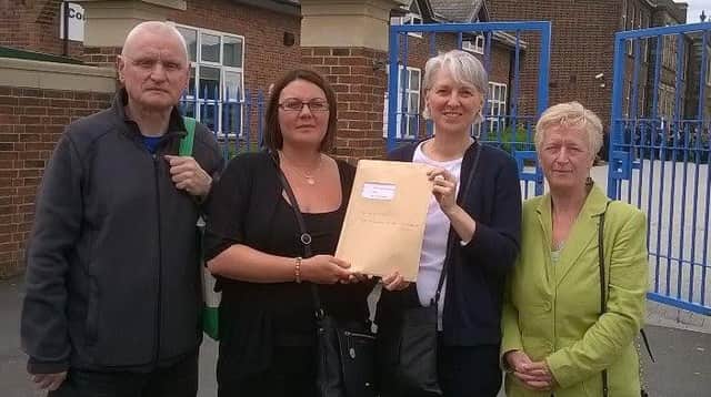 Stephen Peel, Gemma Taylor, Shirley Ford and Lesley Hanson with the petition