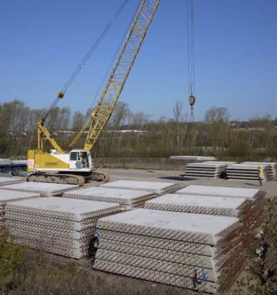 Hundreds of concrete panels have already been delivered to site in preparation for the bridge deck to be built