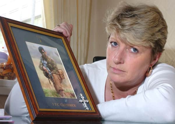 Janice Procter with a picture of her son Private Michael Tench who was killed in Iraq in January 2007.