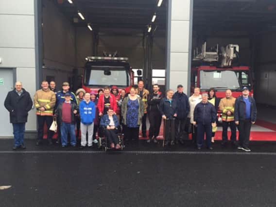 Students, who attend the WEA course at Fulwell Community Centre, on their visit to the new fire station at Marley Park.