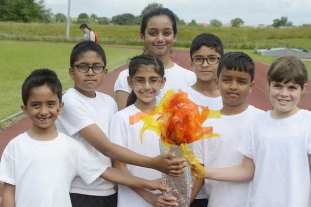 Pupils from Richard Avenue Primary School taking part in their Olympic event at Silksworth Sports Complex.
Torch carriers