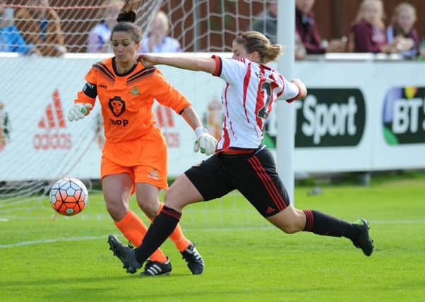 Sunderland's Abby Holmes puts pressure on the Doncaster keeper