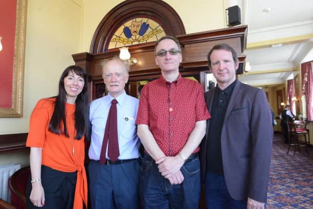 Fillmmaker Esther Johnson and creative producer Bob Stanley, right), with Denis and Christopher Linfoot, the son and grandson of Arthur Linfoot - one of the stories featured in the film.