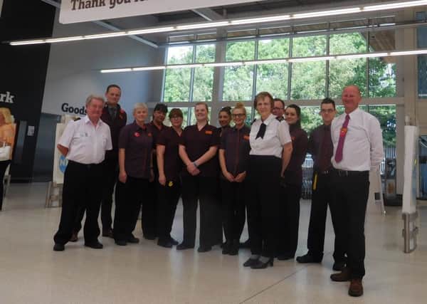 Staff at Sainsbury's Sunderland North store with members of Sunderland Volunteer Life Brigade.