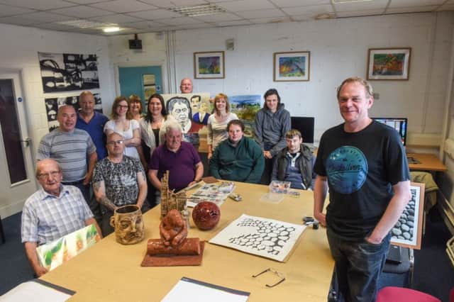 The Art Studio is celebrating a grant from The Big Lottery Fund. Pictured are some of the members with studio manager Barney Craggs, right.