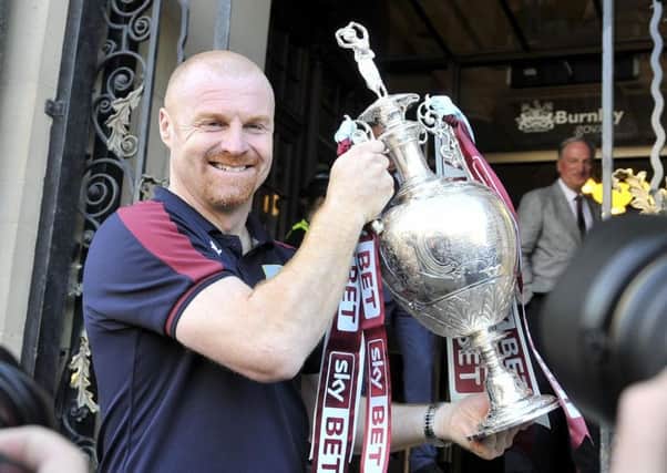 Sean Dyche lifted the Championship trophy last season