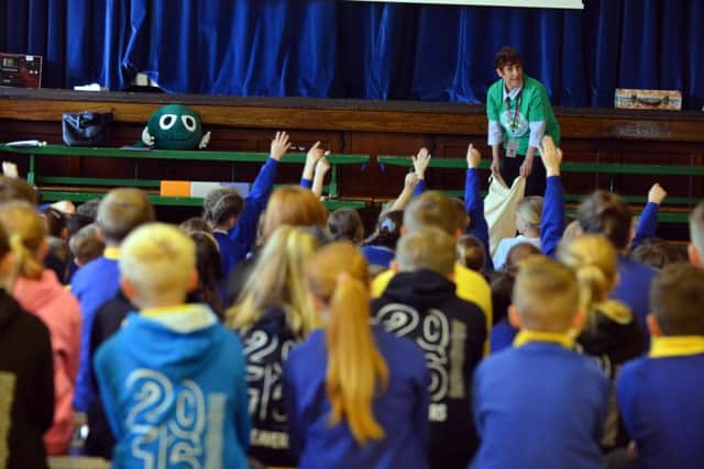 NSPCC volunteer Susan Evans at the assembly at Our Lady Queen of Peace Primary School.