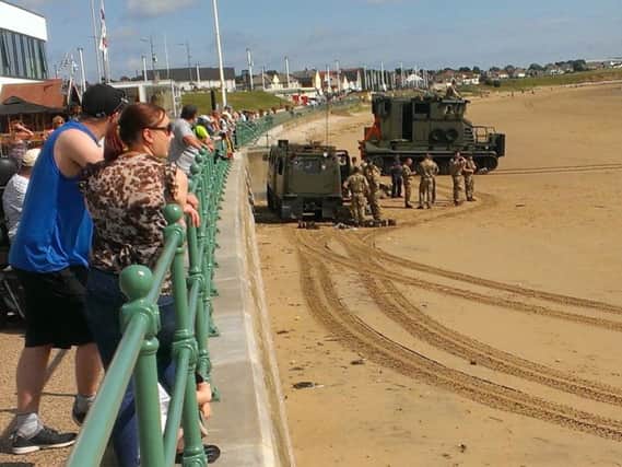 A practice beach assault involving a number of armed forces personnel, in Seaburn.