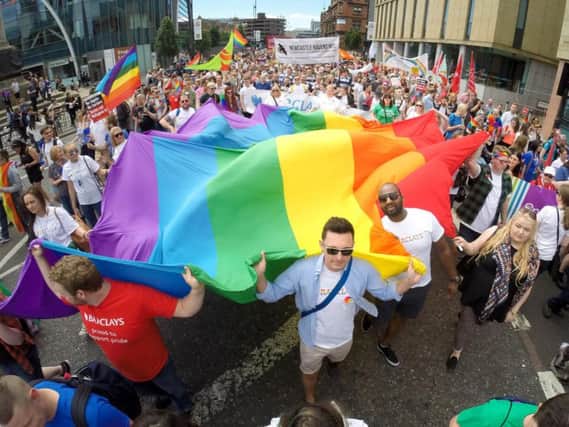 More than 12,000 people took part in the Newcastle Pride parade.