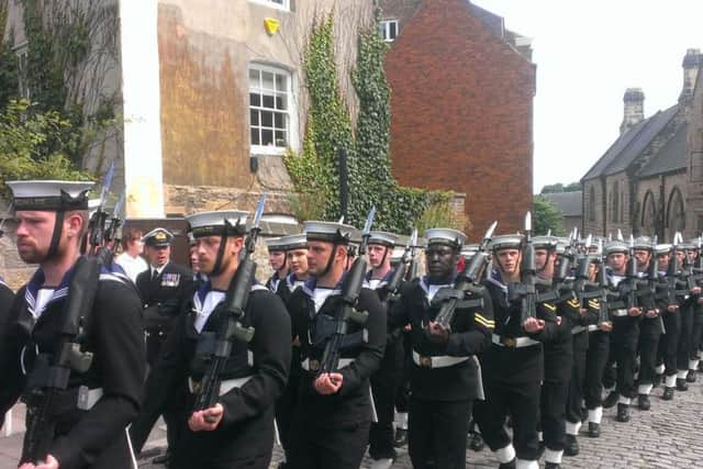 The crew of HMS Bulwark parade through the streets of Durham.