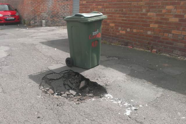 A hole in the lane behind 159 Chester Road, Sunderland.