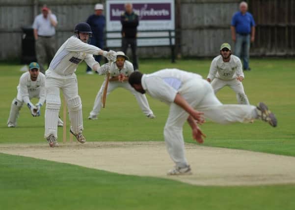 Whitburn batsman Ross Carty gets into all sorts of bother under pressure from  Hetton Lyons bowler Gary Adey.