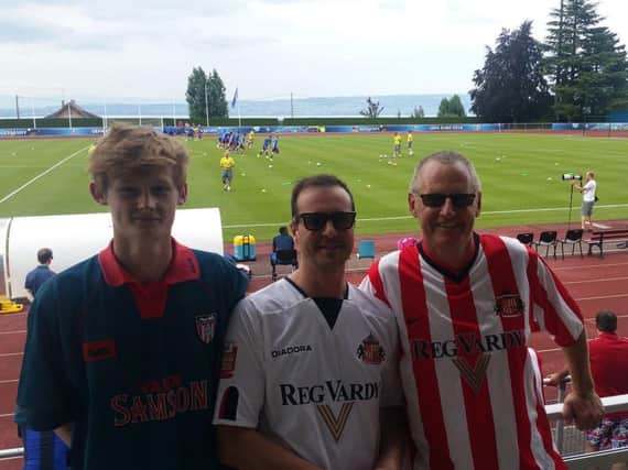 (LtoR) Sunderland fans Louis Osborne, Anthony Harrison and John Osborne