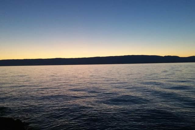 The sun sets on Lake Geneva