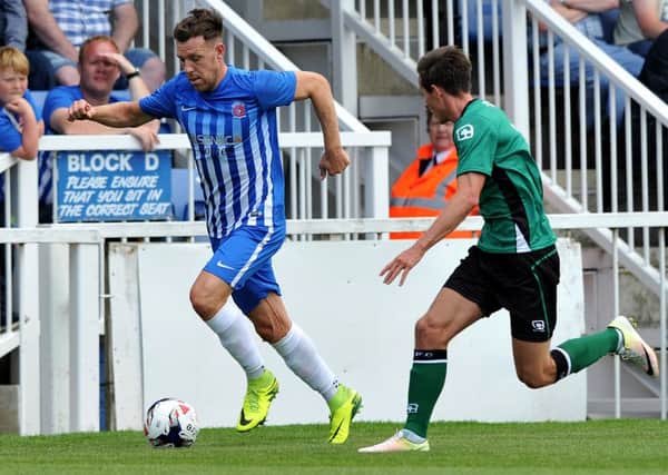 Pools right-back Carl Magnay takes on Scunthorpe