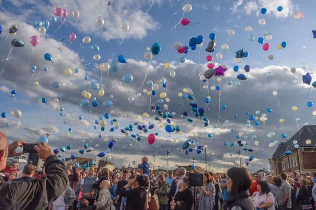 Balloon release and vigil at the entrance to Seaham Marina, last night,  in memory of Megan Bell who died at T in the Park festival.