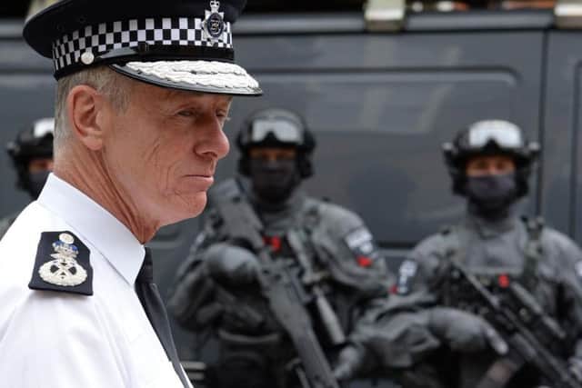 Metropolitan Police Commissioner Sir Bernard Hogan-Howe with armed police preparing to deploy from Hyde Park, central London, as Scotland Yard announced that the first of 600 additional armed officers were trained and operationally ready, and unveiled plans to put more marksmen on public patrol. (Photo: PA)