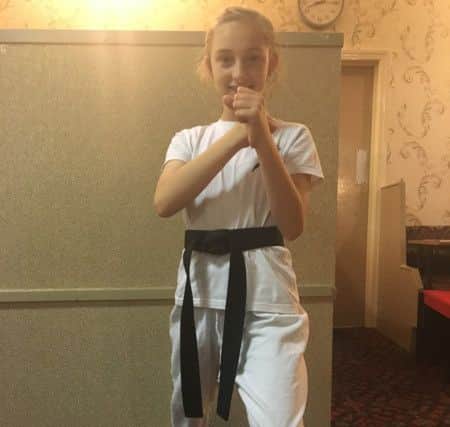 Red House Karate Club member Chloe Hughes who has been successful in her recent grading.