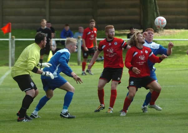 Silksworth CW (red) pile the pressure on Hartlepool in the TWR Bifolds Wearside League. Picture by Kevin Brady