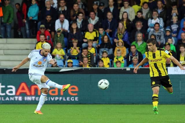 Fabio Borini, set to start the season up front for Sunderland, gets in a shot against Borussia Dortmund in the final pre-season friendly