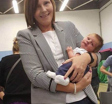 Class leader Lorna Parker with the newest visitor to the class.