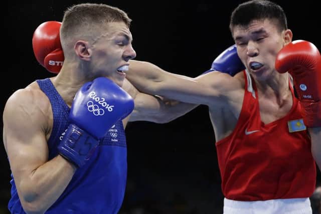 Wearsider Pat McCormack (left) battles Kazakhstan's Ablaikhan Zhussupov in Rio