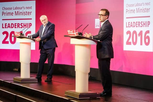 Jeremy Corbyn watches as Owen Smith, right, speaks during a Labour leadership hustings at the Hilton Newcastle Gateshead hotel. Pic: PA.