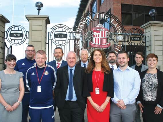 Newly-appointed staff at the Beacon of Light School. From left to right back row: Chris Frazer, Dave Hewson, Stuart Curry, Chris Roberts and Ian Kirby.
Left to right front row: Lindsay Howells, Chris Gowland, Mike Redshaw, Principal Denise Taylor , Wayne Gee and Stephanie Forster.