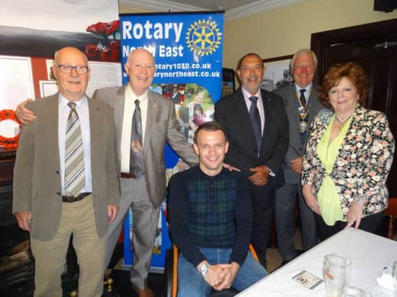 Andy Bell with members of the Rotary Club of Washington.