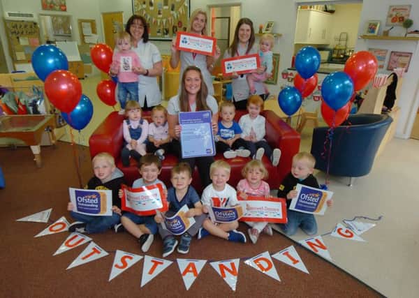 Staff and children at Barnwell Daycare, Barnwell Academy, Penshaw, celebrate being rated as Outstanding by Ofsted.