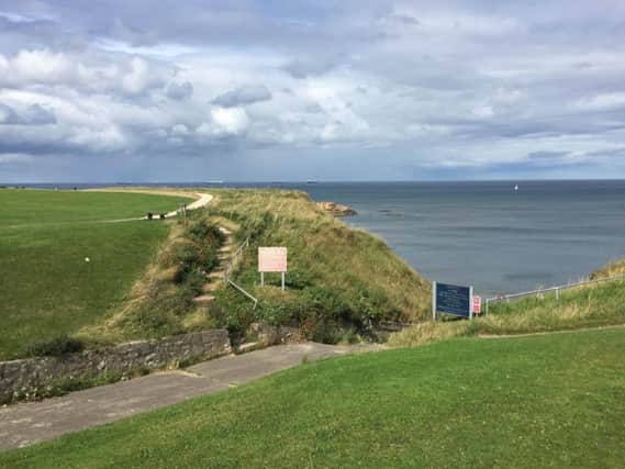 A woman has been flown to hospital in a critical condition after an incident at the cliffs in Marsden.