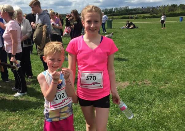 Charlie Hutchinson and Caitlyn Taylor, the nephew and cousin of Sunderland marathon runner Aly Dixon.
