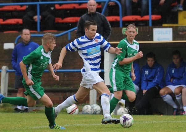 Chester-le-Street (hoops) battle against Marske United in Saturday's FA Cup tie. Picture by Tim Richardson