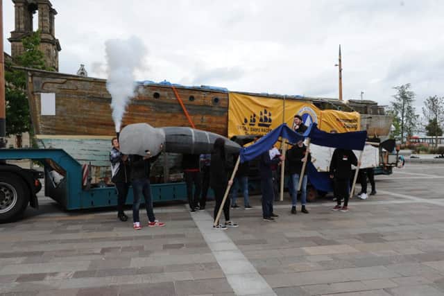 A theatrical performance welcomes the Senora boat to Keel Square, before being taken to Pallion Shipyard for restoration.