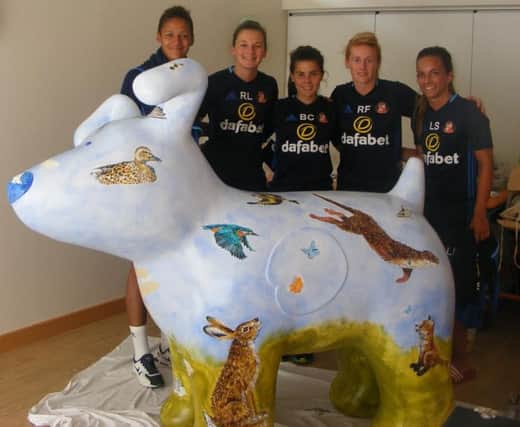 SAFC Ladies with the wildlife-themed Great North Snowdog.
