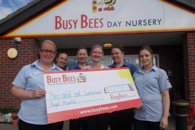 Staff from Busy Bees Day Nursery with the cheque for Sunderland Royal Hospital's Neo-Natal Unit.