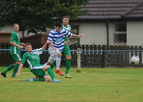 Chester-le-Street (blue and white hoops) battle against Northern League rivals Marske United