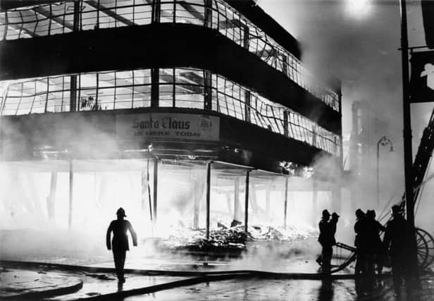 The blaze which devastated the store just before  Christmas.
