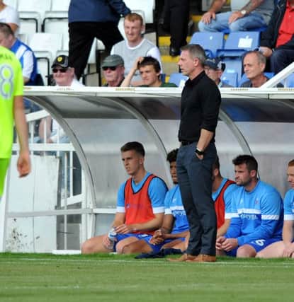 Craig Hignett watches his Hartlepool United side in action