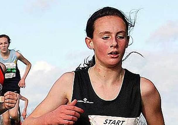Houghton Harrier Anna Pigford won the girls' Watergate race