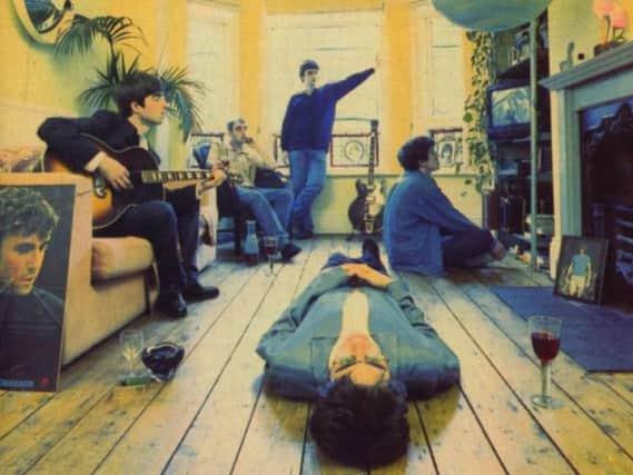 The front cover of Definitely Maybe, by Oasis