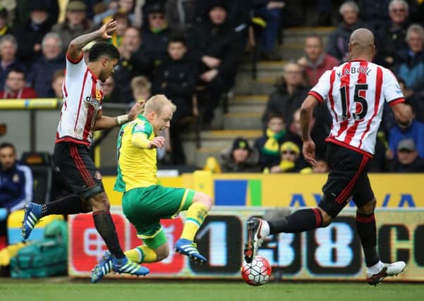 Norwich City's Steven Naismith (centre) in action against Sunderland last season.