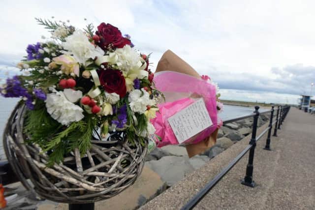 Floral tributes left to teenager Liam Hall.