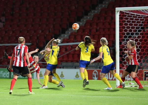 Kelly McDougall volleys home Sunderland Ladies' third goal in last night;s victory at Doncaster Rovers Belles. Picture by Julian Barker