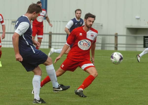 Washington (red) take on Shildon (blue) in the FA Cup first qualifying round at Nissan Sports Complex on Saturday.